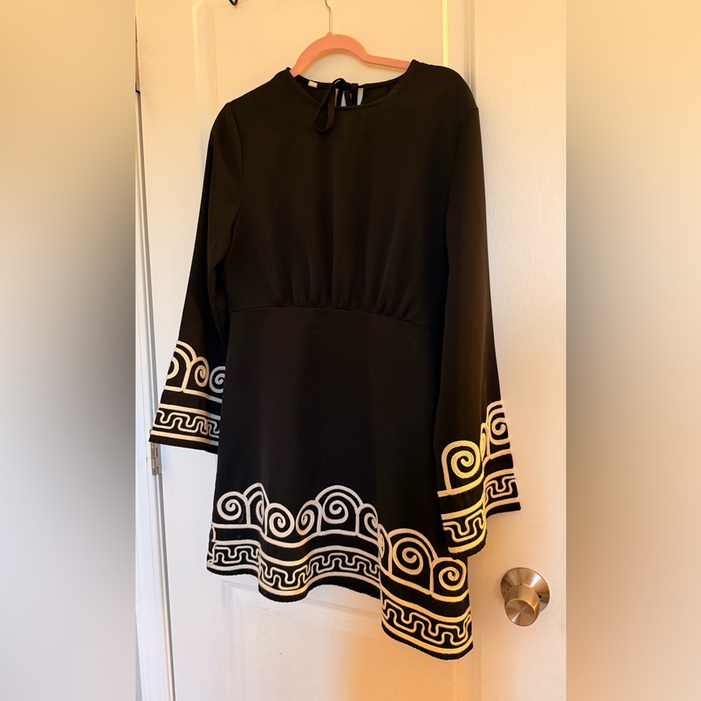 Elegant Black Dress with White Accents